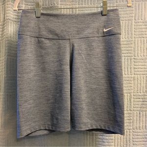 NIKE WOMENS NAVY/HEATHER DRI-FIT FALL 7" BIKE SHORT SIZE MEDIUM